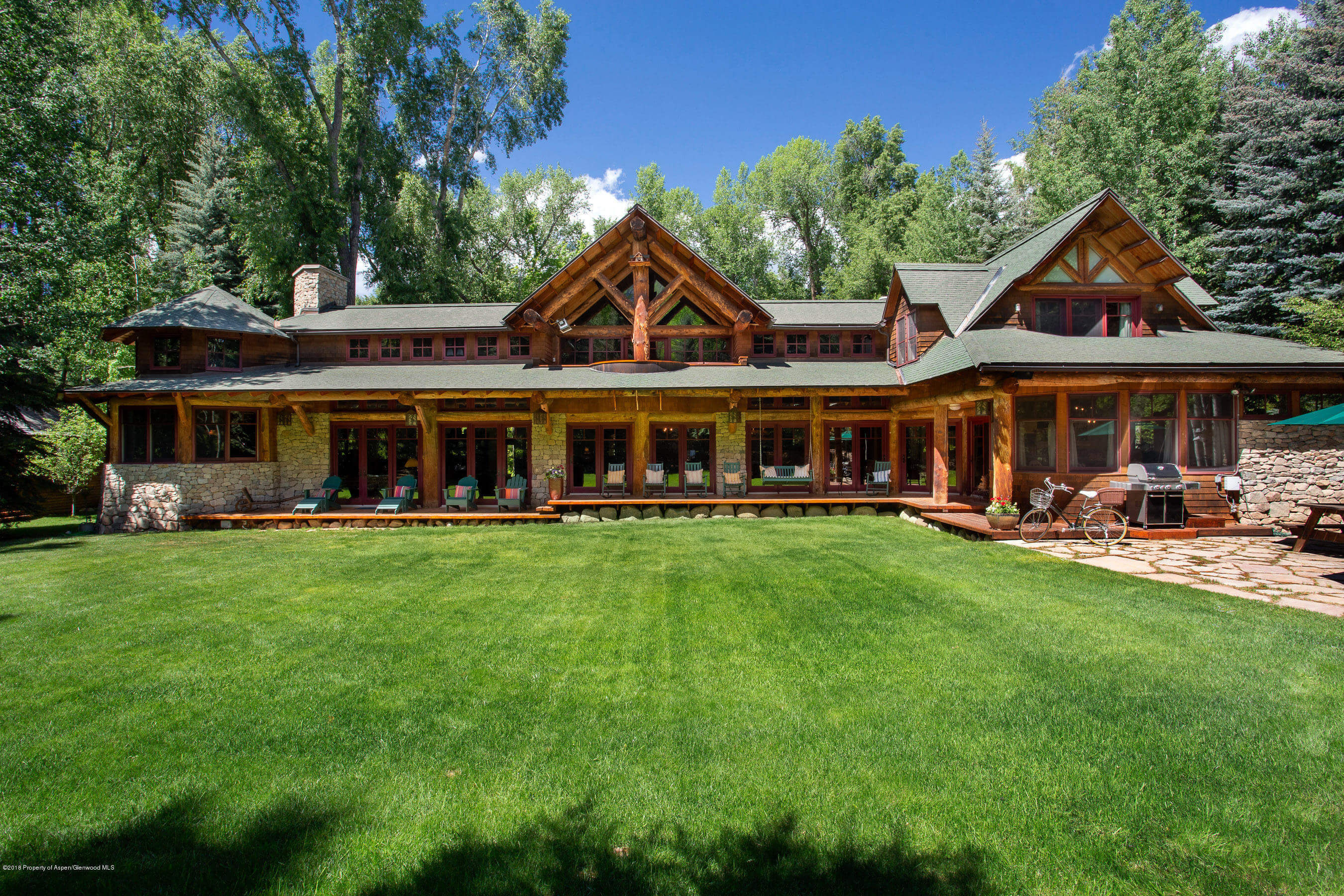 OK Flats Log Home at 390 N. Spring St – Blocks to Downtown – Closes at $11.5M/$2,079 SF Part Furnished Image